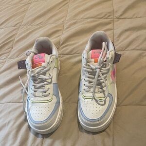 Nike White Sneakers with Pink and Purple Accents